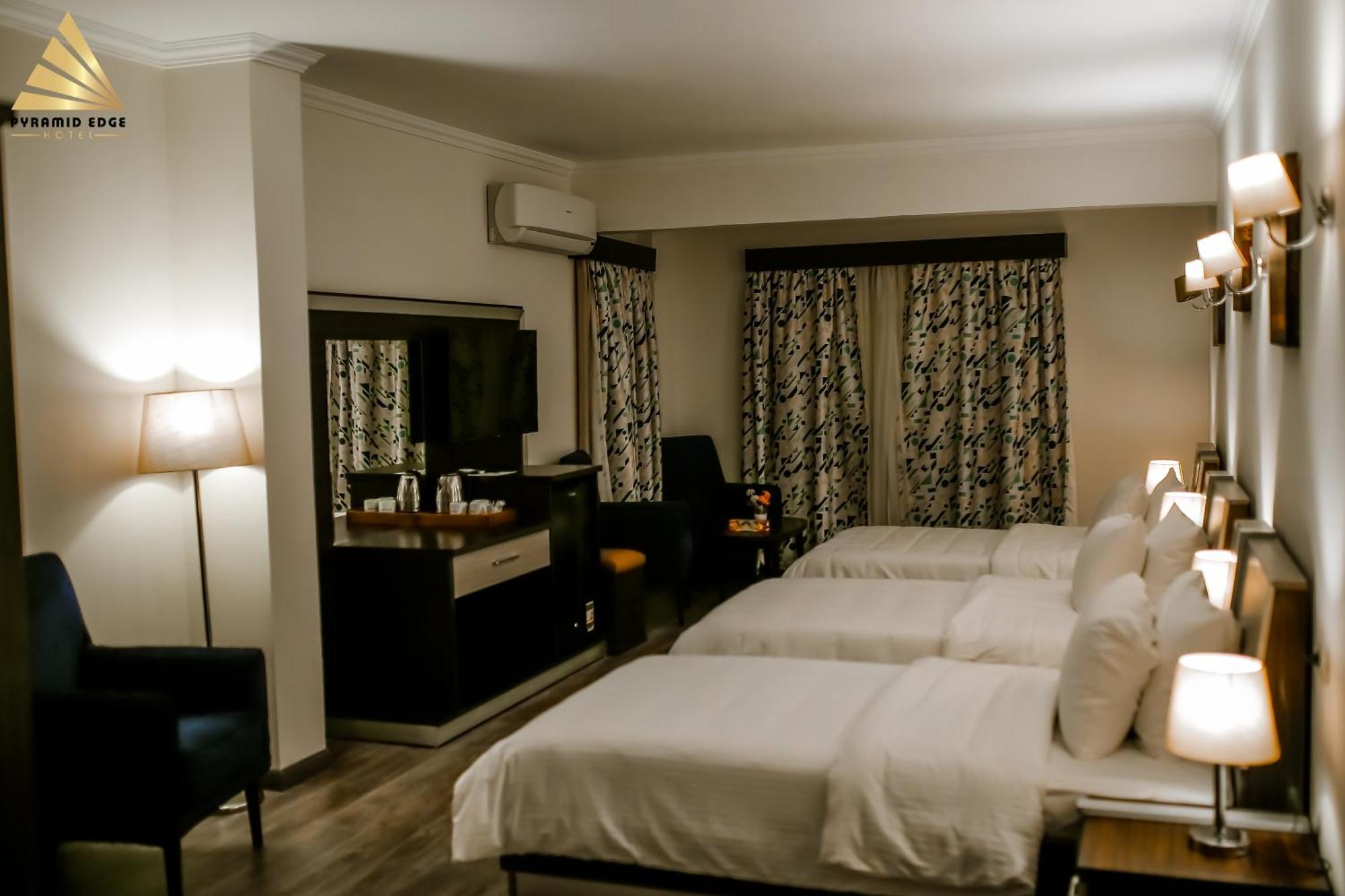 Pyramid Edge Hotel & Exclusive Pyramids View Rooftop Kafret el-Gabal Extérieur photo
